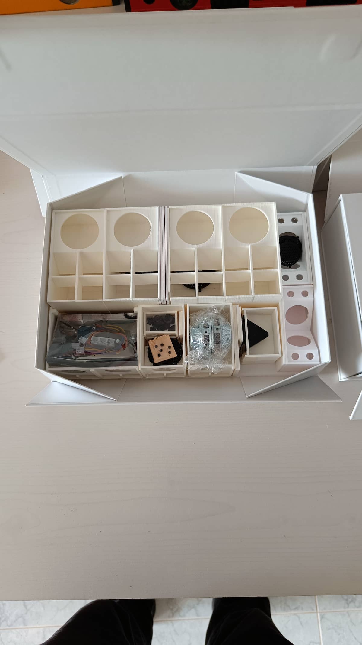 Unboxed DIY reggae sound system kit with components laid out for assembly.