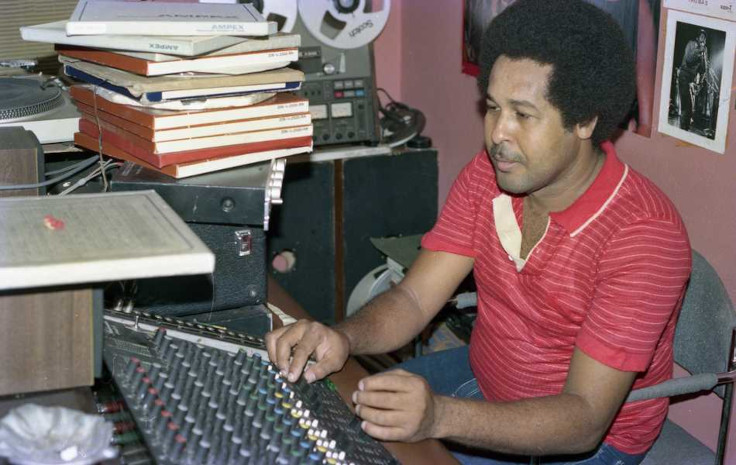 King Tubby and King Jammy at the mixing board in Tubby's studio, highlighting their mentor-mentee relationship and their contributions to reggae and dancehall music.