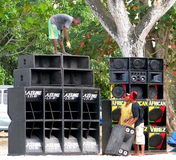 Jamaican sound system setup with large speakers at Long Bay, Negril during Dubdem's 2009 tour - showcasing authentic reggae sound system culture